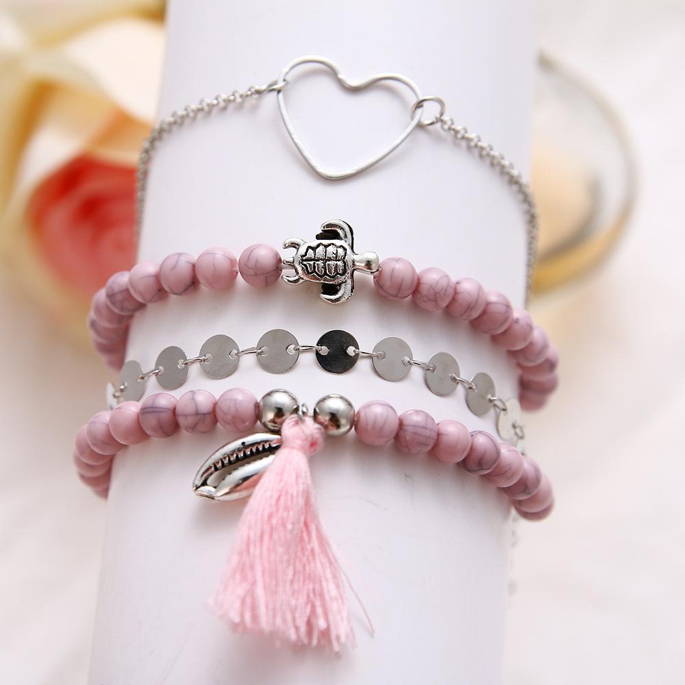 4 Piece Pink Tassell Bracelet Set